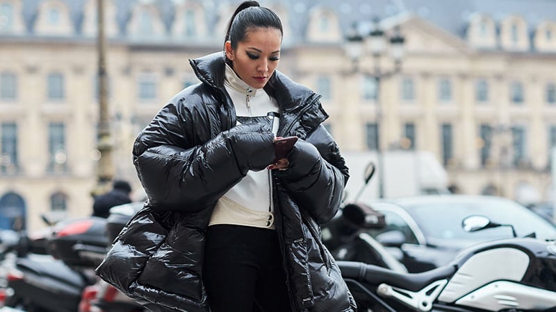 Black down jacket in street