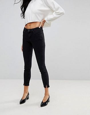 Asos Lisbon Skinny Mid Rise Jeans With Twisted Seams In Washed Black