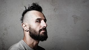 Close Up Portrait Of A Brutal Man With Mohawk. Wide