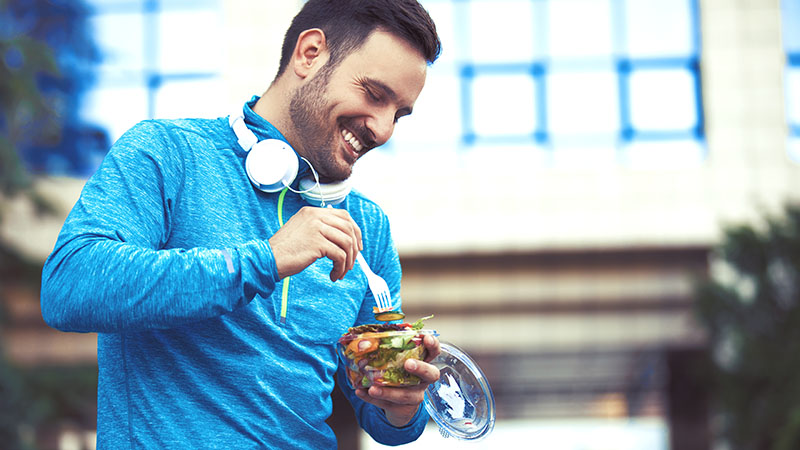 Man Is Eating Vegetable Salad