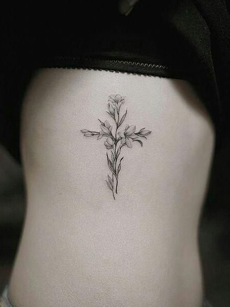 Tattoo uploaded by rustyhst  Instagram rustyhst Custom flower piece  fineline flowers cross cherryblossoms smalltattoo microtattoo color  custom  Tattoodo