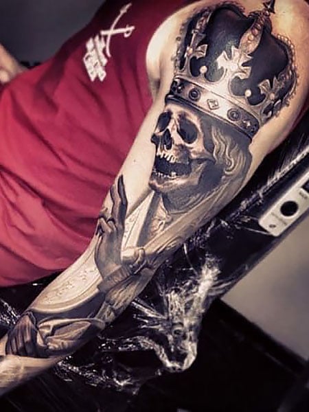 Full Arm Skull Tattoo