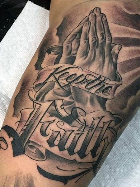 Religious Bicep Tattoos