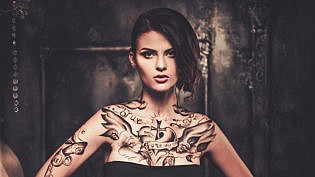 Tattooed Beautiful Woman In Old Spooky Interior