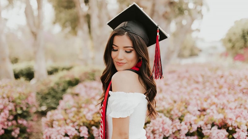 white dress under graduation gown