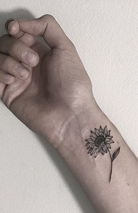 Tatuaje de muñeca de girasol