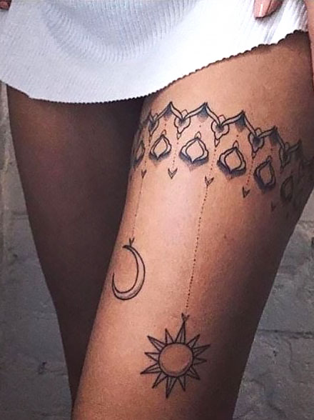 Wrap Around Thigh Tattoo