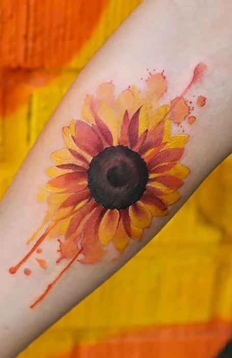 Watercolor sunflower tattoo on the right shoulder