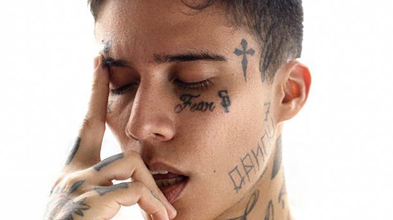 Classy small face tattoos male