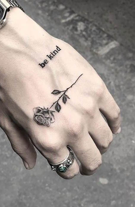 BAD BOY lettering tattoo on Noah Cyrus hand