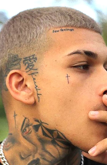 30 Cool Face Tattoos for Men  Meaning  The Trend Spotter