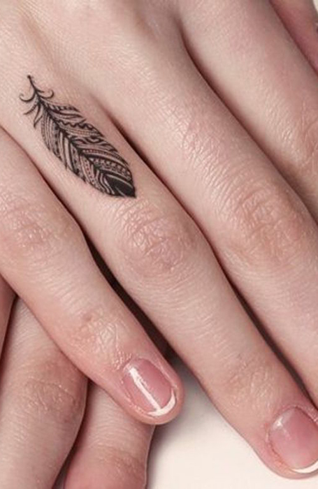 Peacock Feather on Finger Tattoo Idea