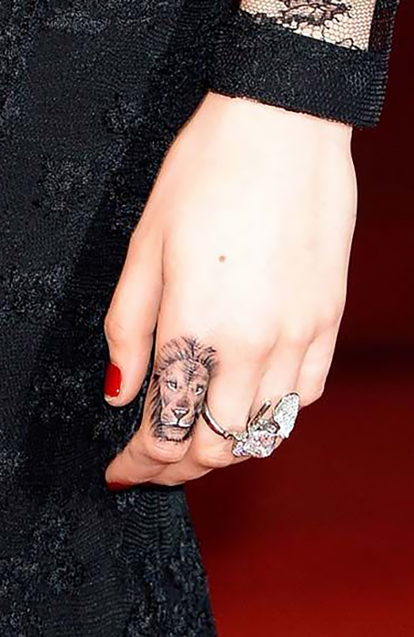 Lion Finger Tattoo