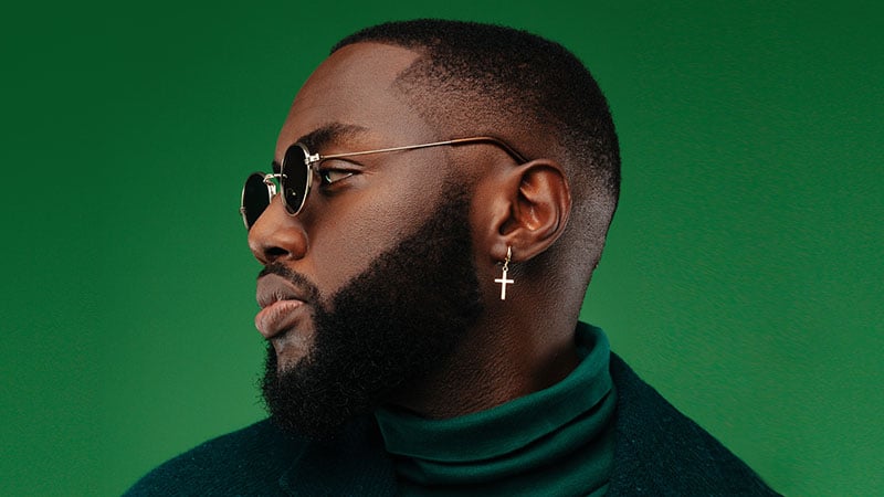 Man Portrait. Style. Handsome Afro American Guy In Green Jacket