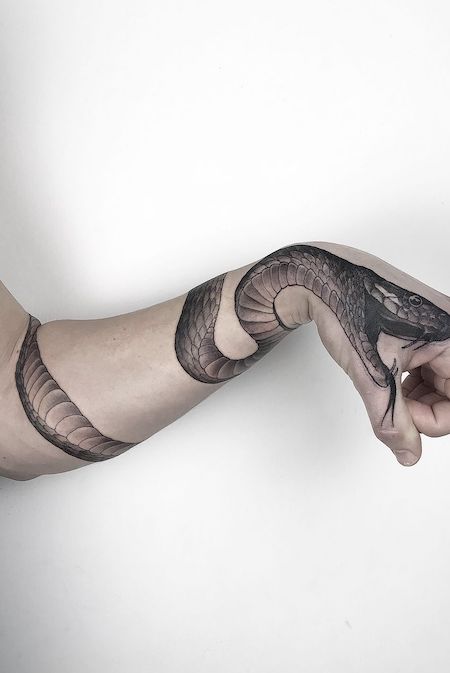 Snake Wrapped Around Arm Tattoo