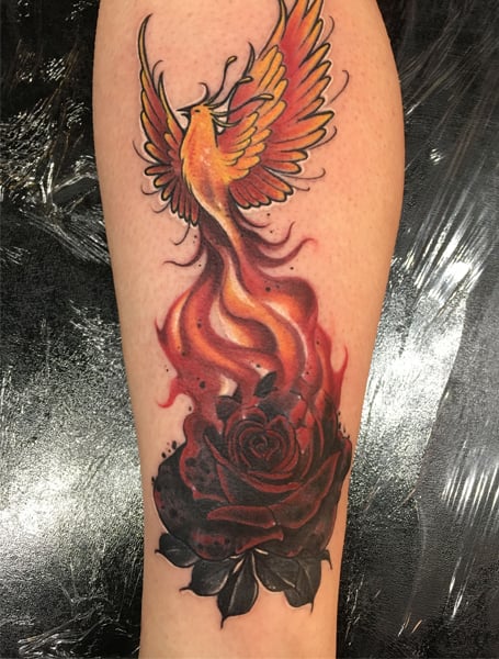 Phoenix Rising From Ashes Tattoo