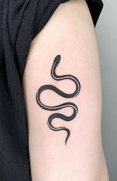 White snake tattoo on the wrist  Tattoogridnet