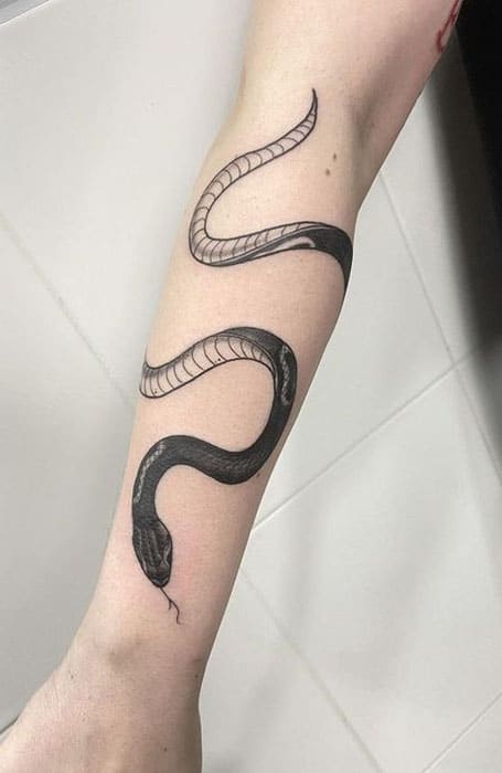 Noir Tattoo Collective   Snake wrapping around by simonatattoo  For  bookings and enquires DM or email  Reposted withrepost noirtattoocoll  ink art tattooartist blackwork liverpooltattoo tattoolife  ladytattooers snaketattoo  Facebook