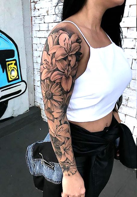 Arm sleeves tattoo woman