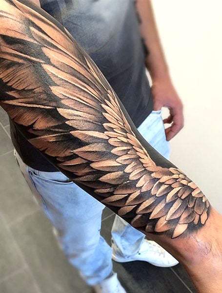 20 Cool Angel Wing Tattoos for Men in 2023 - The Trend Spotter