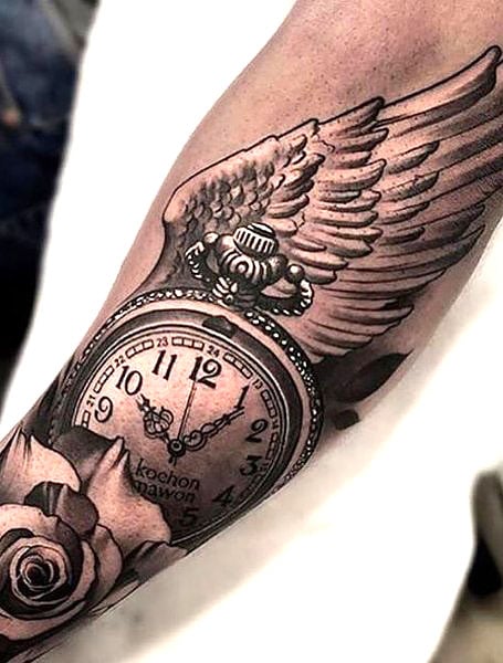 wing tattoo forearm