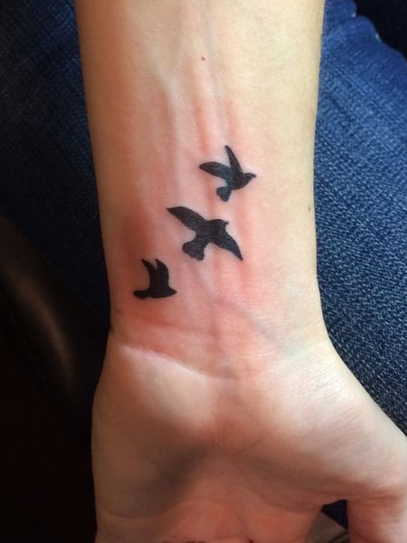 Bird Silhouette Tattoo