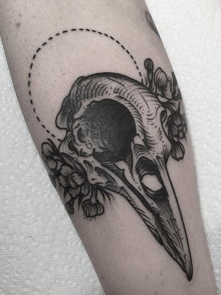 Tatuaje de cráneo de pájaro