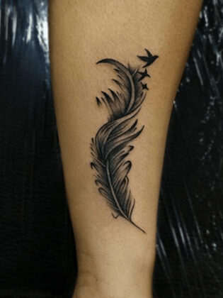 25 Carefree Bird Tattoo Designs Meaning The Trend Spotter Feather With Birds Tattoo 315x420