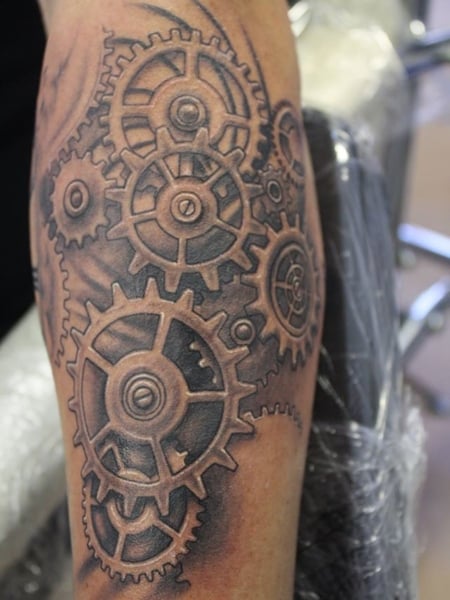 Black and gray clock and gears tattoo  Gear tattoo Clock tattoo sleeve  Watch tattoos