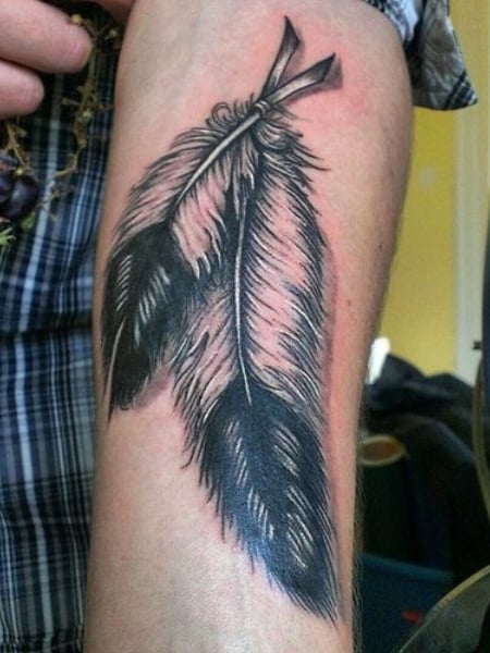 feather quill tattoo on hand  Feather tattoo design Tattoo designs Quill  tattoo