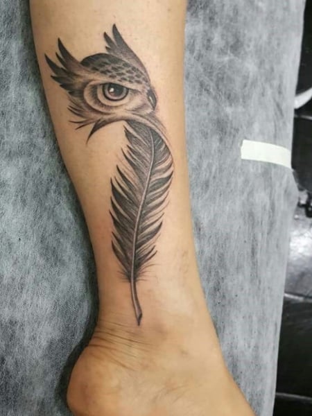 25 Feather Tattoo Designs & Meaning (2023) - The Trend Spotter