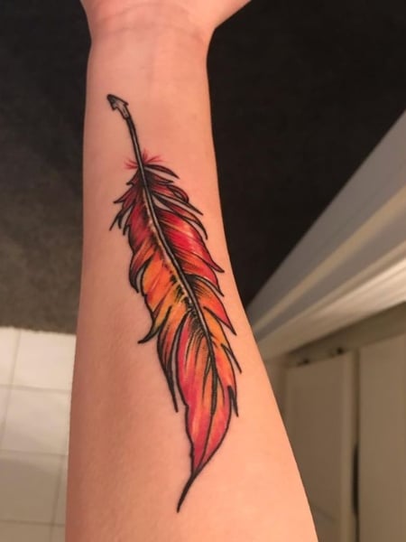 Small White Ink Feather Tattoo Idea