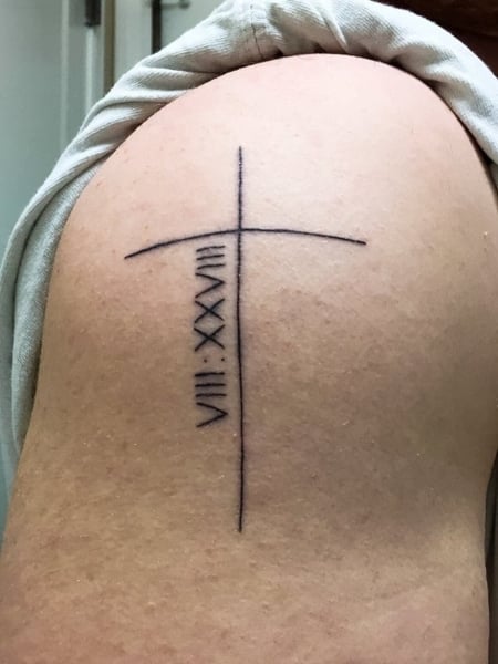 Roman Numerals And Cross Tattoo