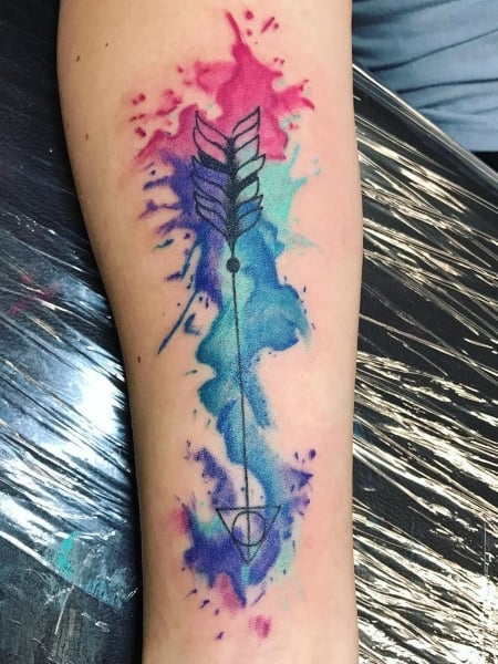 WATERCOLOR ARROW TATTOO ON ARM  Arrow tattoos for women Feather tattoos  Beautiful tattoos