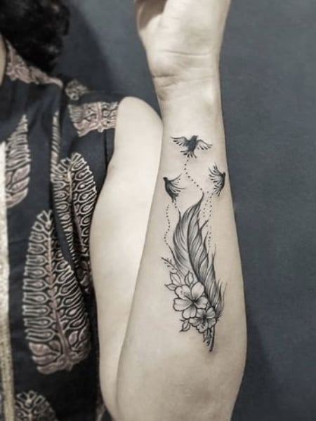 Forearm Feather Tattoo