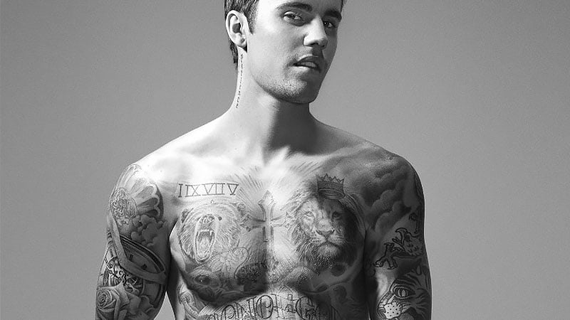 Justin's Roman Numeral Tattoo on His Chest / Shoulder- PopStarTats