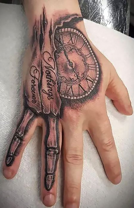 hand tattoo men clockTikTok Search