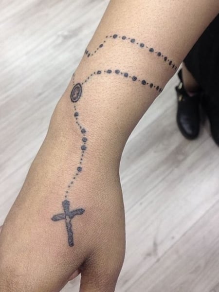Rosary Tattoo On The Wrist 