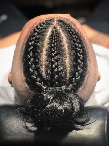 Three Cornrow Braids With Man Bun