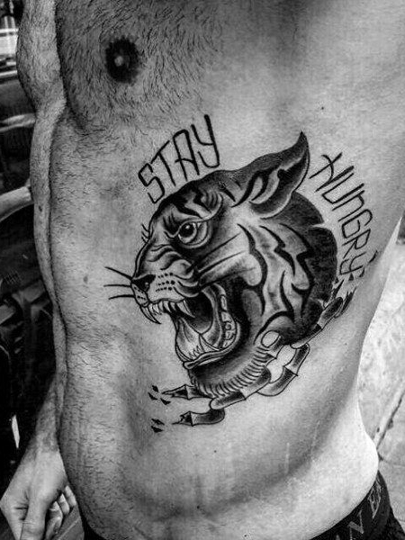 Tiger tattoo on the rib healed