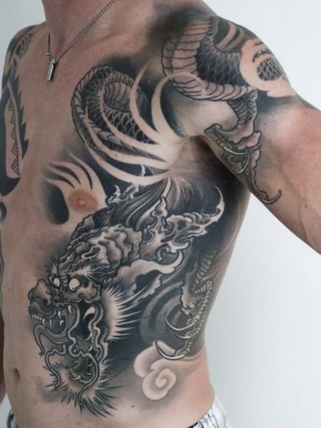 20 Cool Rib Tattoos for Men in 2023 - The Trend Spotter