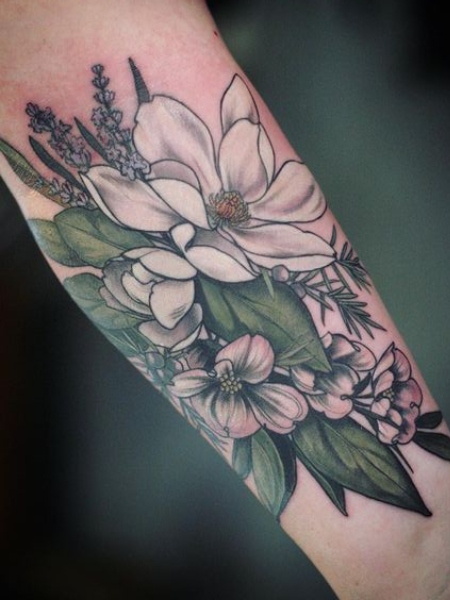 Magnolia flowers on the ribs tattoo  Bunker Tattoo  Quality tattoos