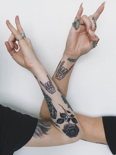 Rock And Roll Skeleton Hand Tattoo 