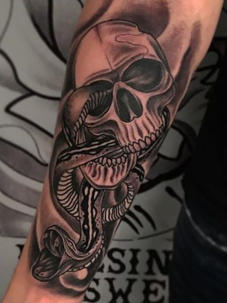 Skeleton Skull And Snake Hand Tattoo