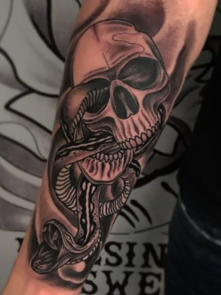 40 Skeleton Hand Tattoo Ideas That Look Cool  TattooTab