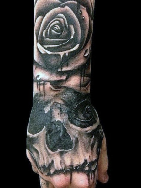 Stipple skeleton hand and rose by  Juniper Moon Tattoo  Facebook