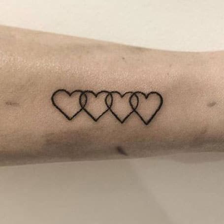 8 Small Tattoos That Mean Big Things  Tattoodo