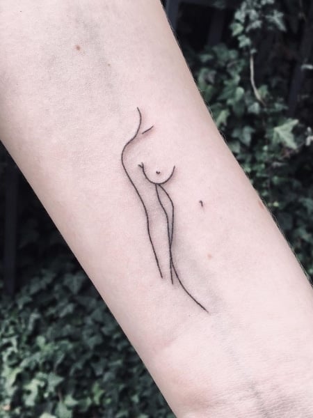 Tattoo of a womans silhouette on the right upper arm  Small tattoos  Tattoos Tattoos for women