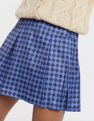One Above Another Mini Pleated Skirt In Diamond Print