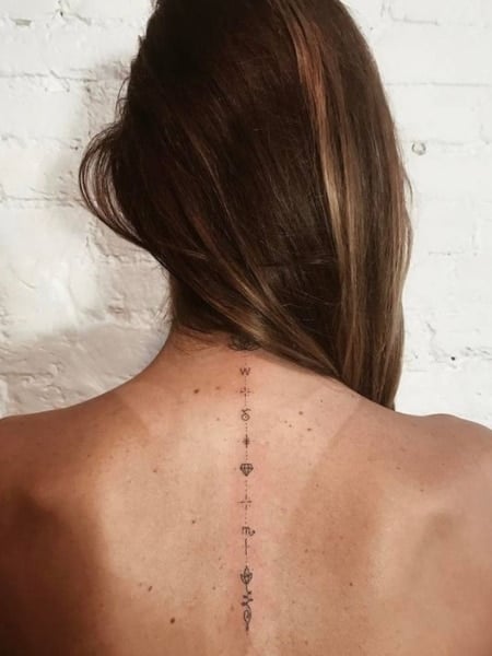 50 Inspirational Spine Tattoo Ideas for Women with Meaning  MyBodiArt